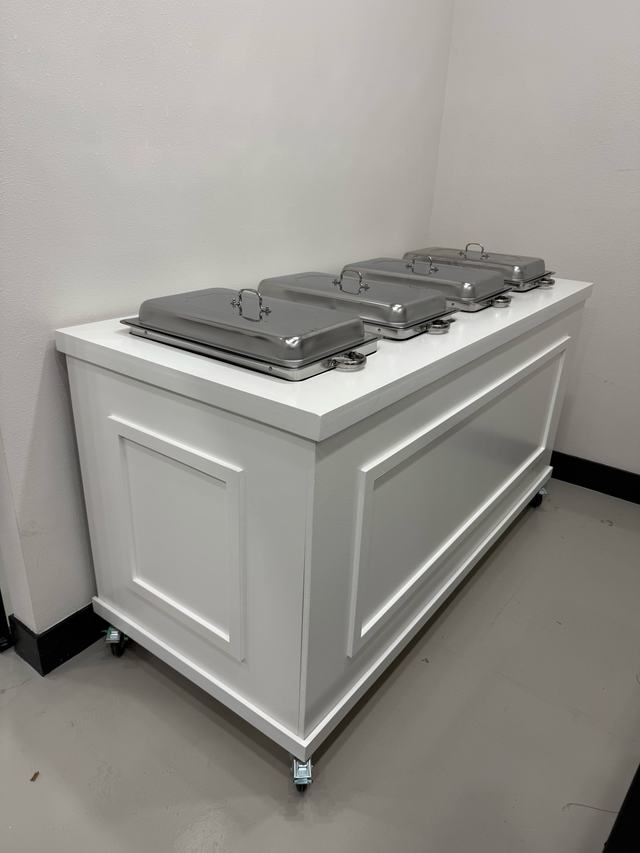 White food cart set with silver chafing dishes